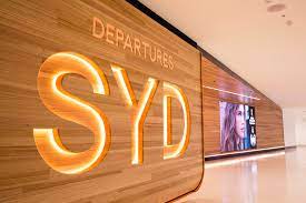 Sydney International Airport SYD departure sign